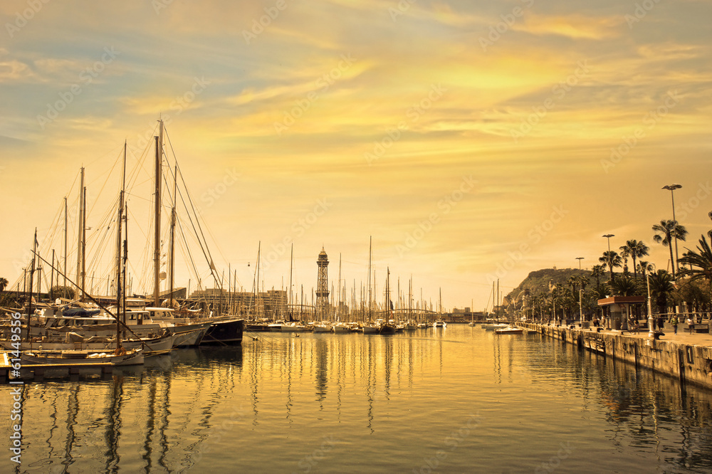 Marina port with yachts in Barcelona at sunrise. Spain