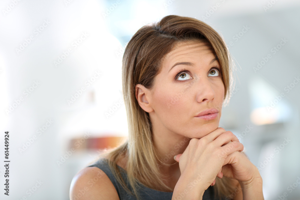 Portrait of businesswoman with thoughtful look Portrait of businesswoman with thoughtful look
