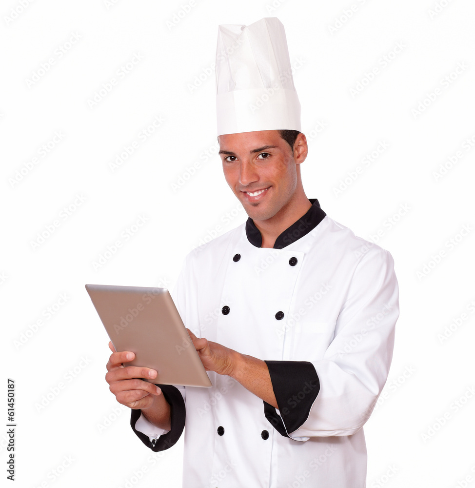 Professional chef man using his tablet pc Professional chef man using his tablet pc