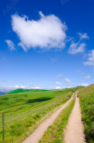 Dirt Road Under A Cloud In Blue Sky  Montenegro