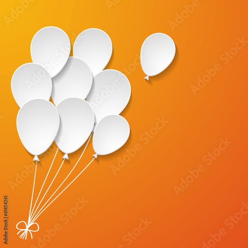 white paper balloons on the orange background