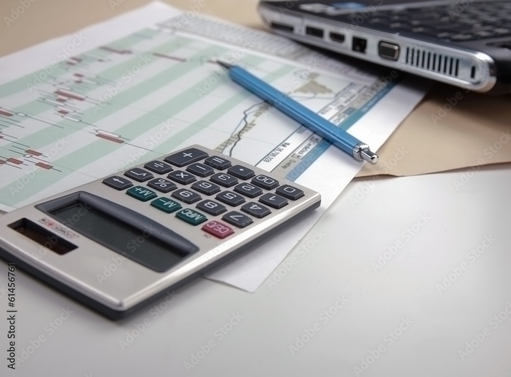 Calculator, pen, folder with documents, laptop.