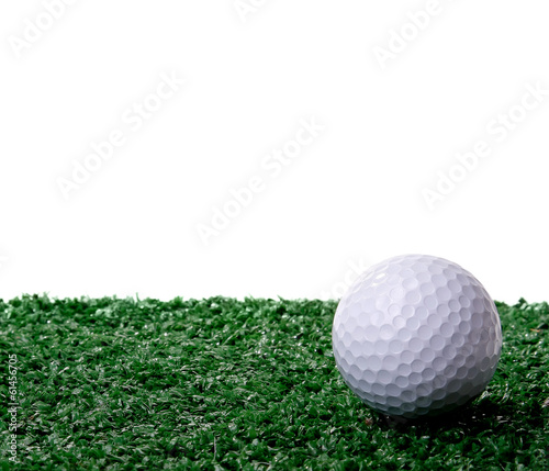 Golf ball ower green grass