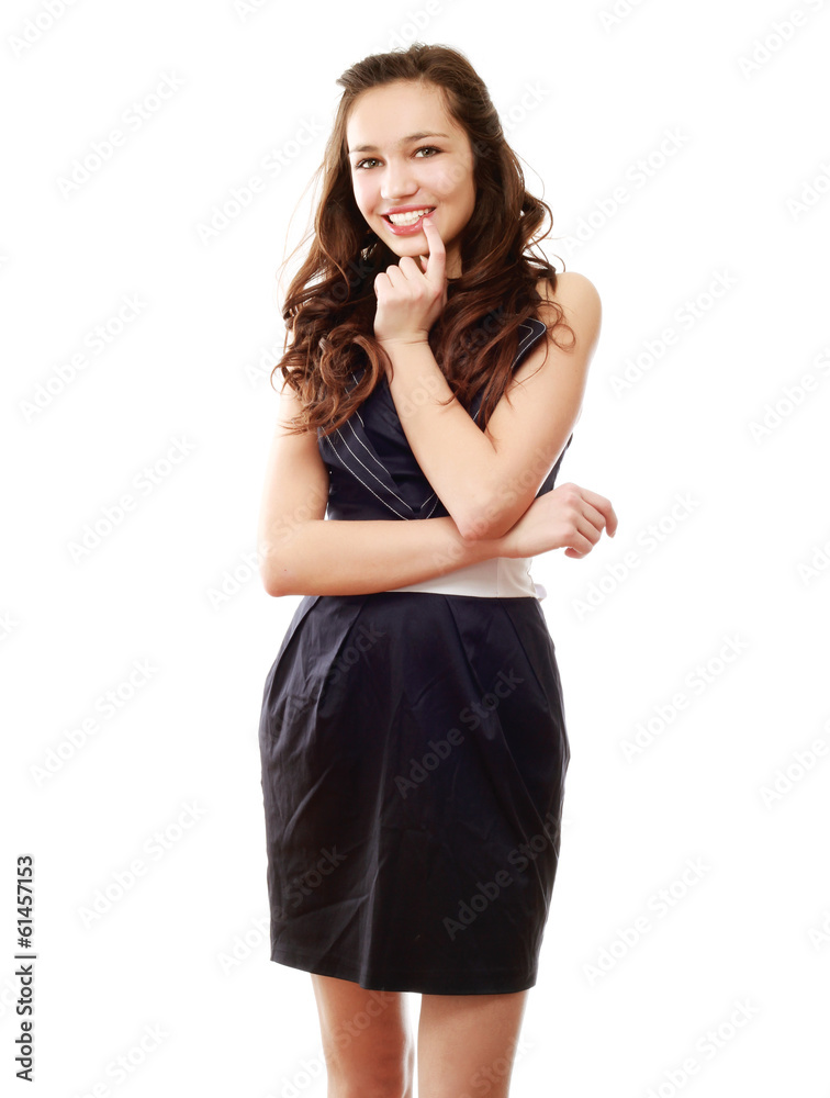 A beautiful woman in a black dress looking aside A beautiful woman in a black dress looking aside