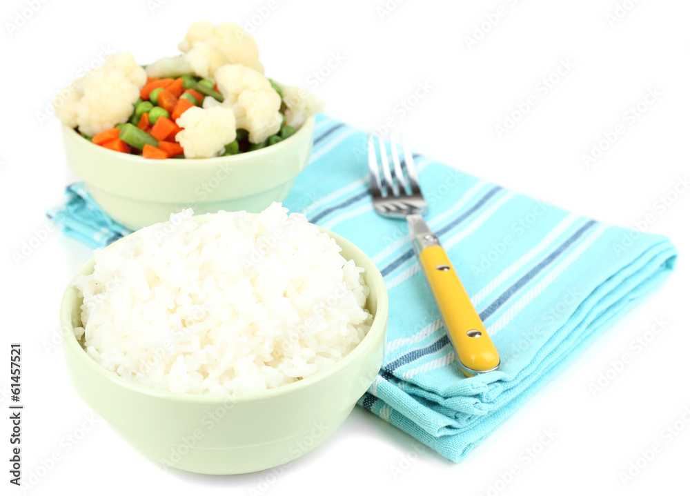Cooked rice and vegetables isolated on white Cooked rice and vegetables isolated on white