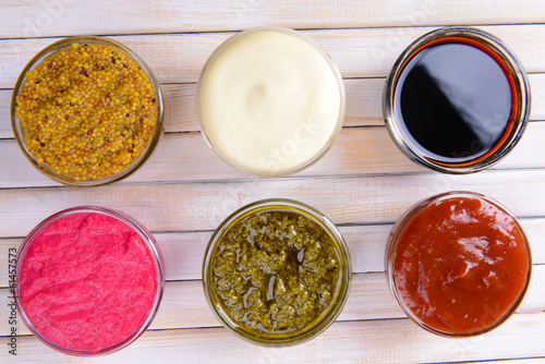 Various sauces on table close-up