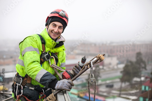 Industrial climber on a metal construction