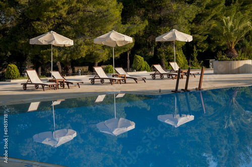 Luxury swimming pool in the tropical hotel