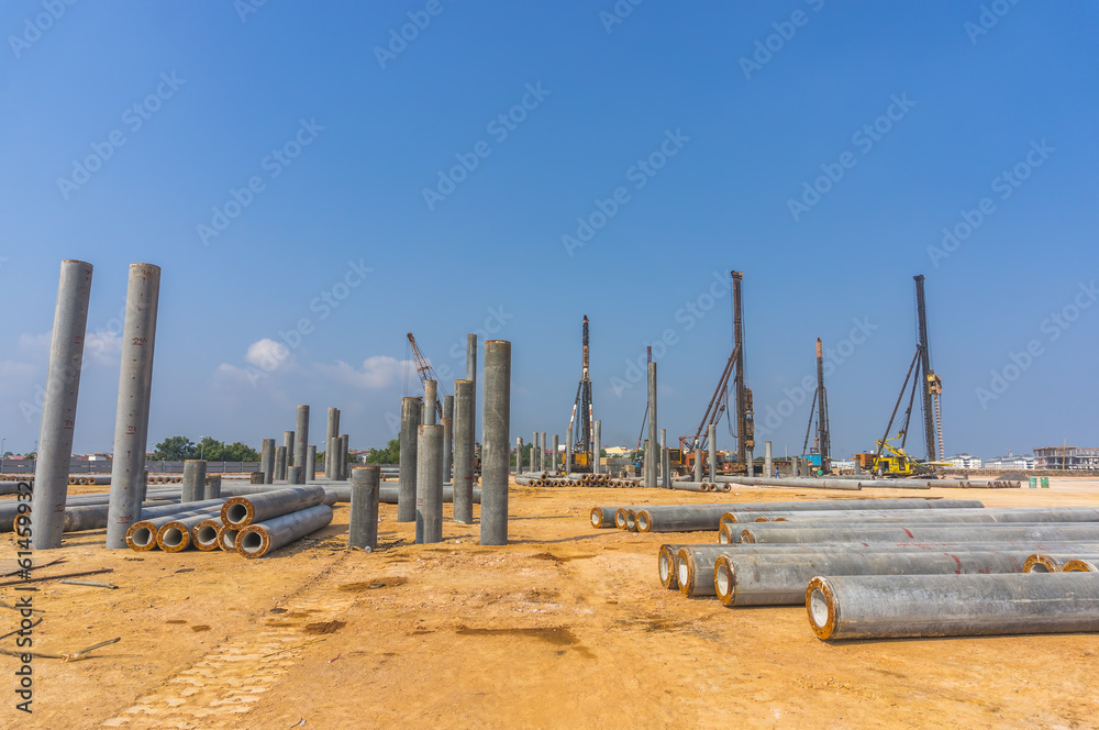 Piling work at construction site with blue skies background