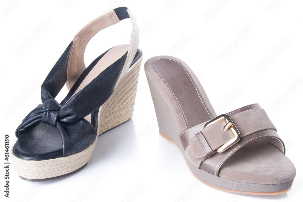 Fototapeta premium shoe. woman sandal on a background