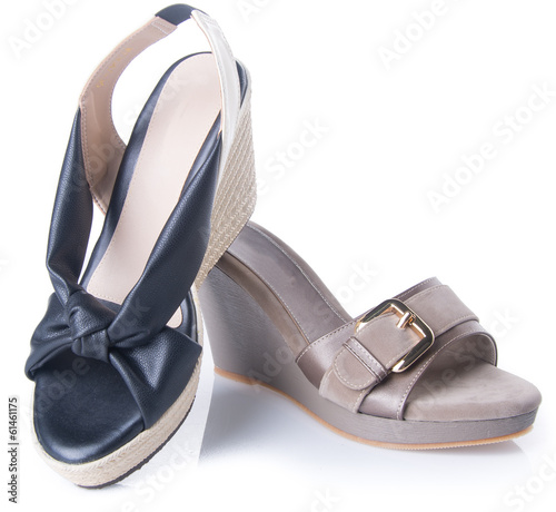shoe. woman sandal on a background