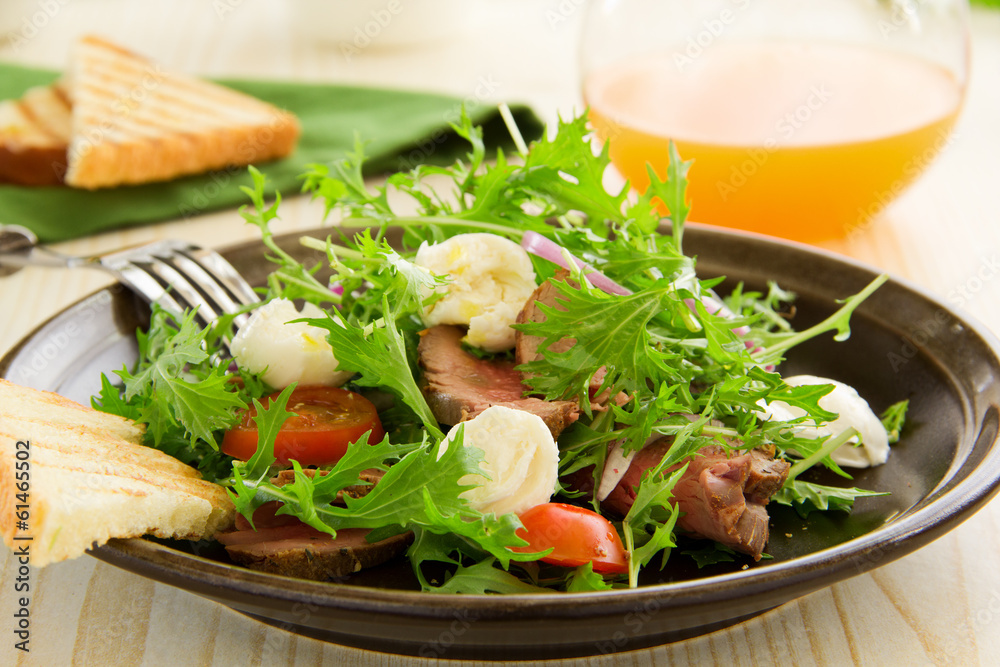 Roast beef salad with tomatoes and mozzarella. Roast beef salad with tomatoes and mozzarella.