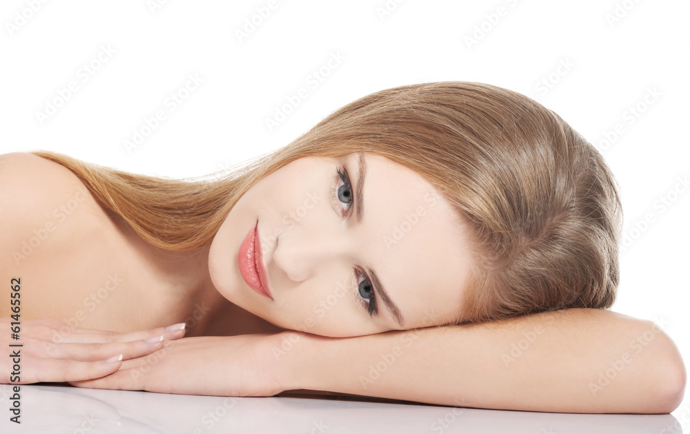 Beautiful naked topless caucasian woman lying down. Beautiful naked topless caucasian woman lying down.