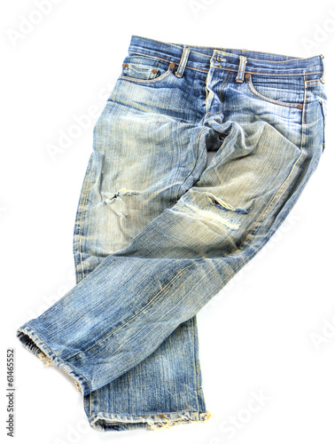 old used jeans trousers isolated