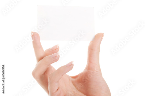 Empty, white personal card between fingers.