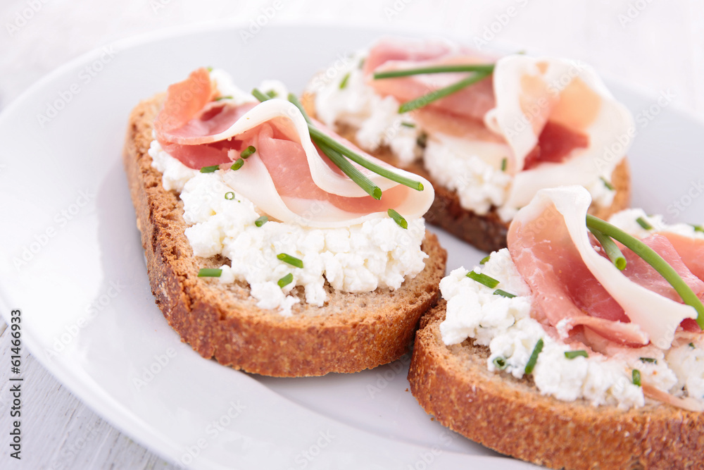 canape with cheese and prosciutto