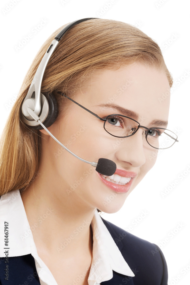 Beautiful caucasian business woman at call center. Beautiful caucasian business woman at call center.