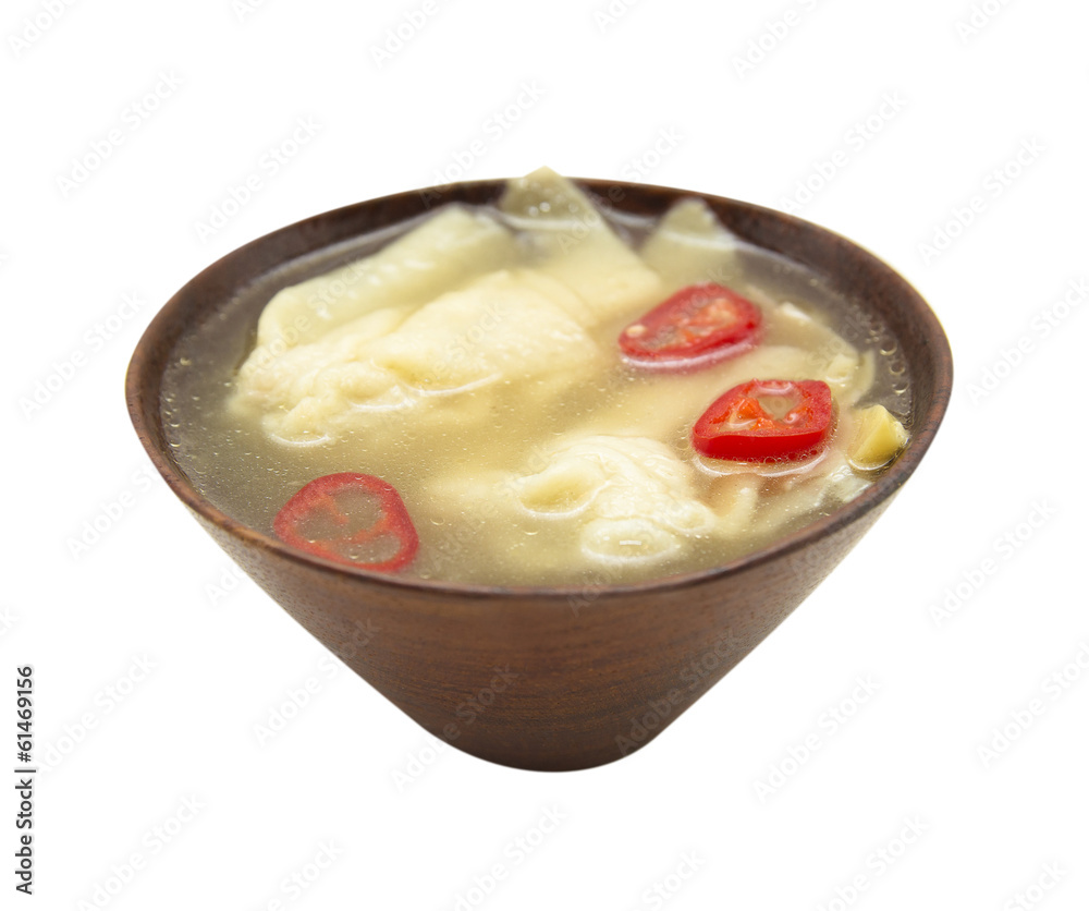 Wonton soup with chili in wooden bowl,asian cuisine, isolated Wonton soup with chili in wooden bowl,asian cuisine, isolated