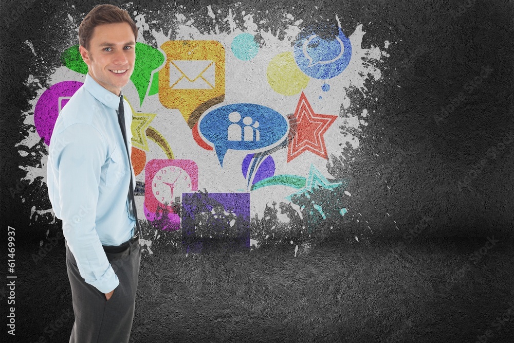 Composite image of happy businessman standing with hand in Composite image of happy businessman standing with hand in