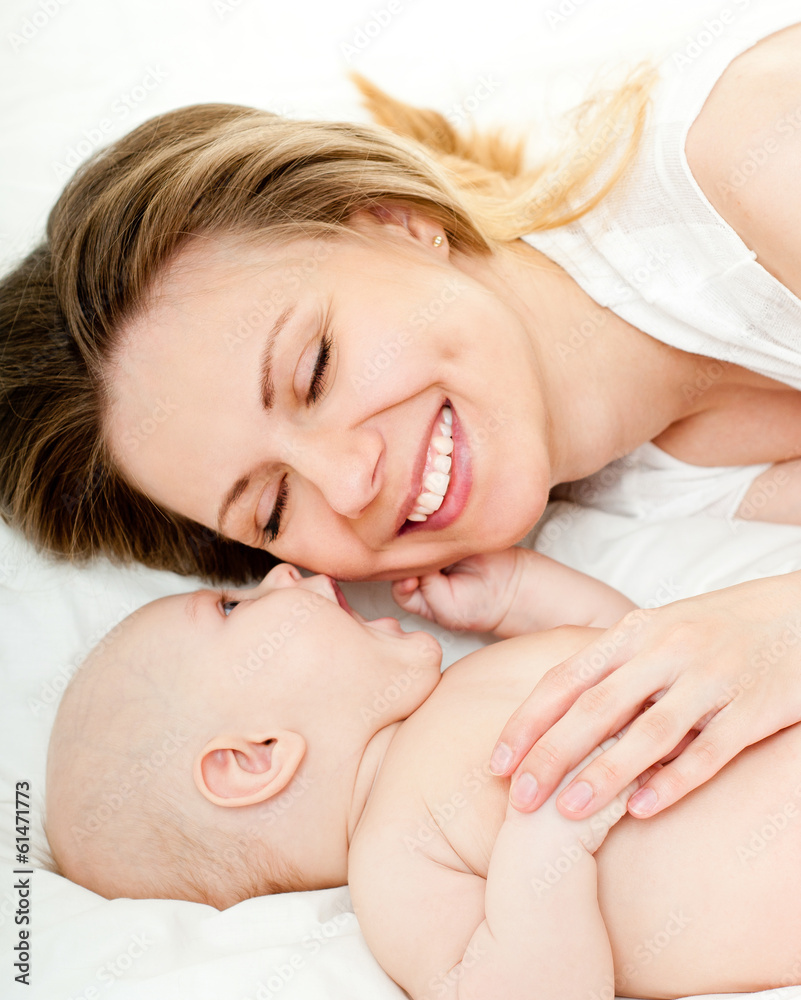 happy mother with baby over white happy mother with baby over white