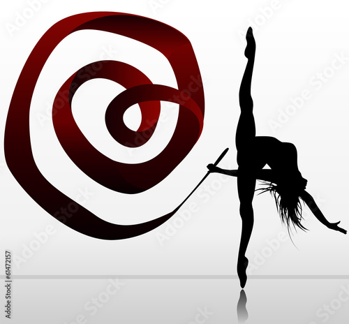 Flexible girl dancing with ribbon