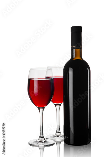 Glasses and bottles of red wine isolated