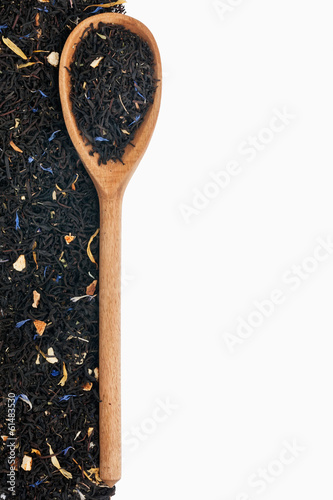 Spoon with black tea