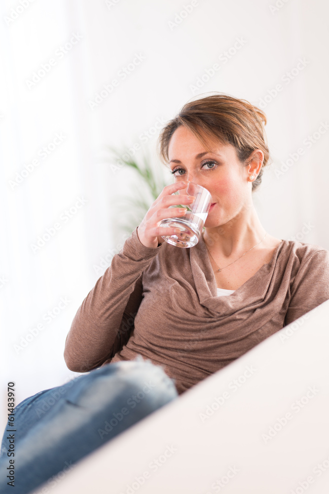 healthy young women drinking mineral water healthy young women drinking mineral water