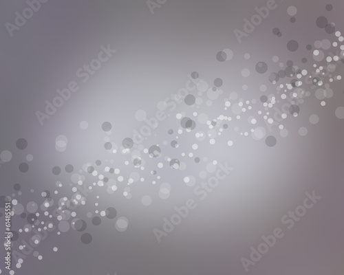 soft silver background with some blurred lights in it