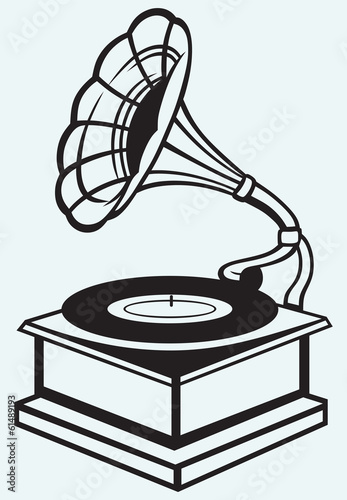 Old record player isolated on blue batskground