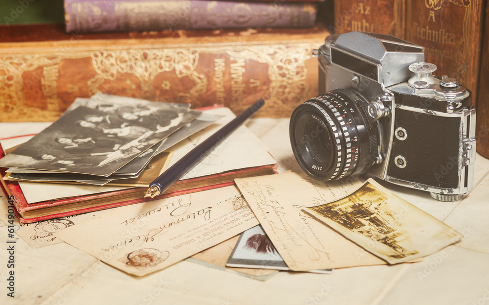 retro camera, old photos, letters and books with pen composition