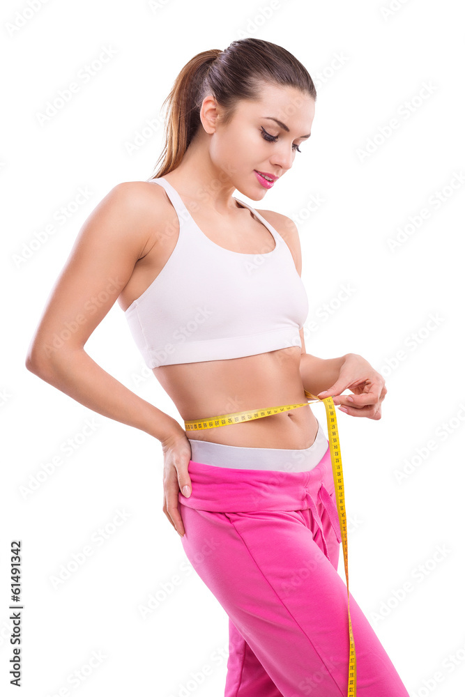 Weight losing - measuring beautiful woman's body Weight losing - measuring beautiful woman's body