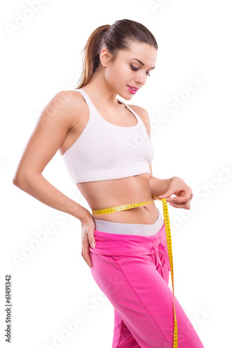 Weight losing - measuring beautiful woman's body