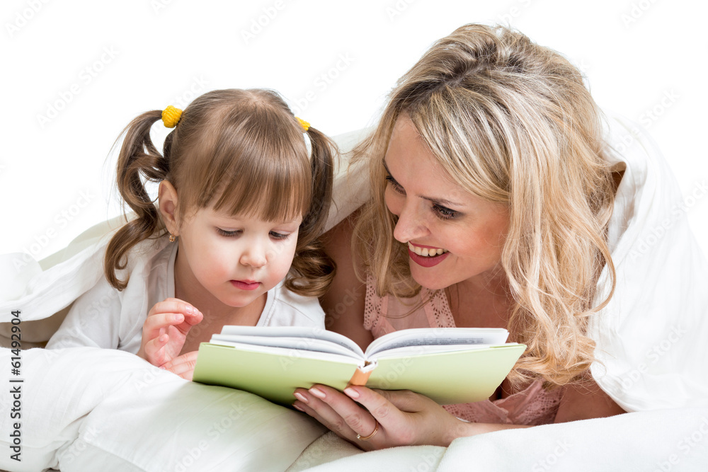 mom reading to kid a book in the bed