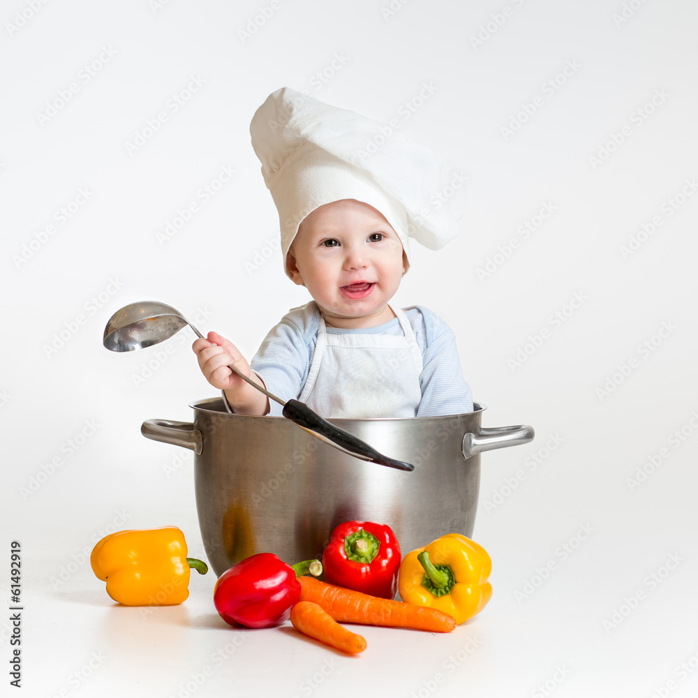 cook baby sitting inside pan with healthy food cook baby sitting inside pan with healthy food