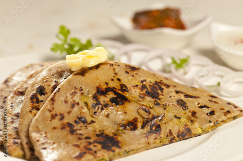 Hot delicious paratha with ghee.