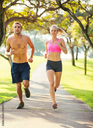 Couple running together in the park