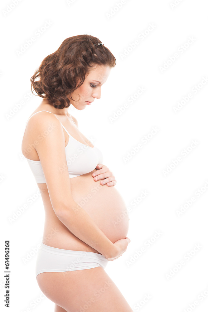 A happy pregnant woman isolated on white A happy pregnant woman isolated on white