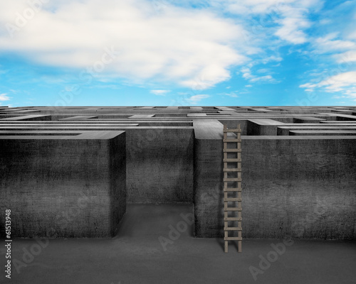 Maze with wooden ladder and blue sky