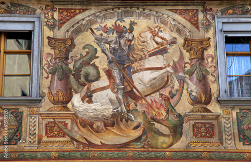 fresco with St. George on medieval building