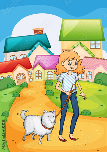 A woman strolling with her dog