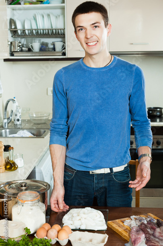 man cooking photo