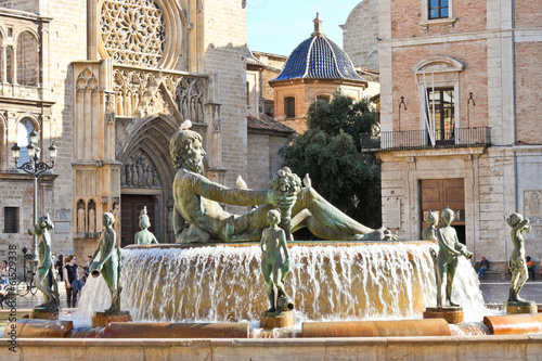 Turia Fountain on Plaza de la Virgen in Valencia, Spain photo