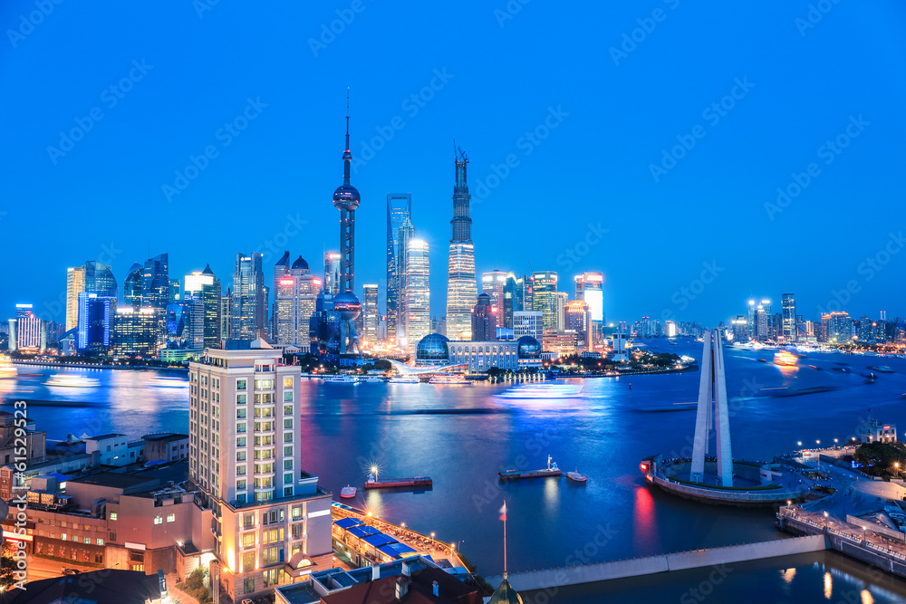 shanghai skyline and huangpu river in nightfall