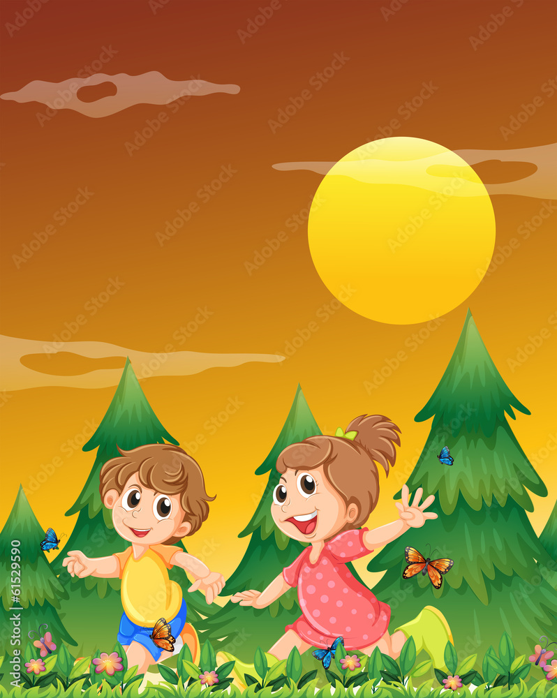 Two kids playing at the garden with the butterflies Two kids playing at the garden with the butterflies
