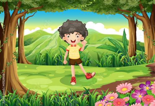A curly boy at the forest