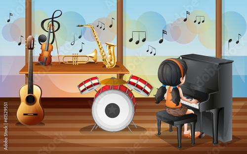 A young pianist inside the music room