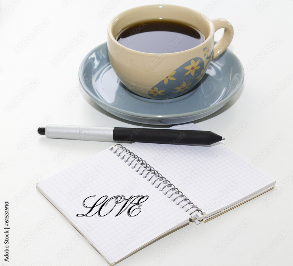 cup of coffee with notebook