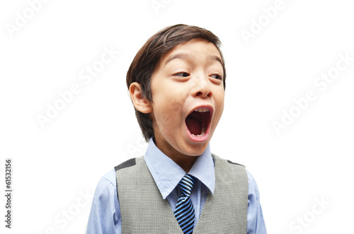 little boy open mouth wide surprise face on white background