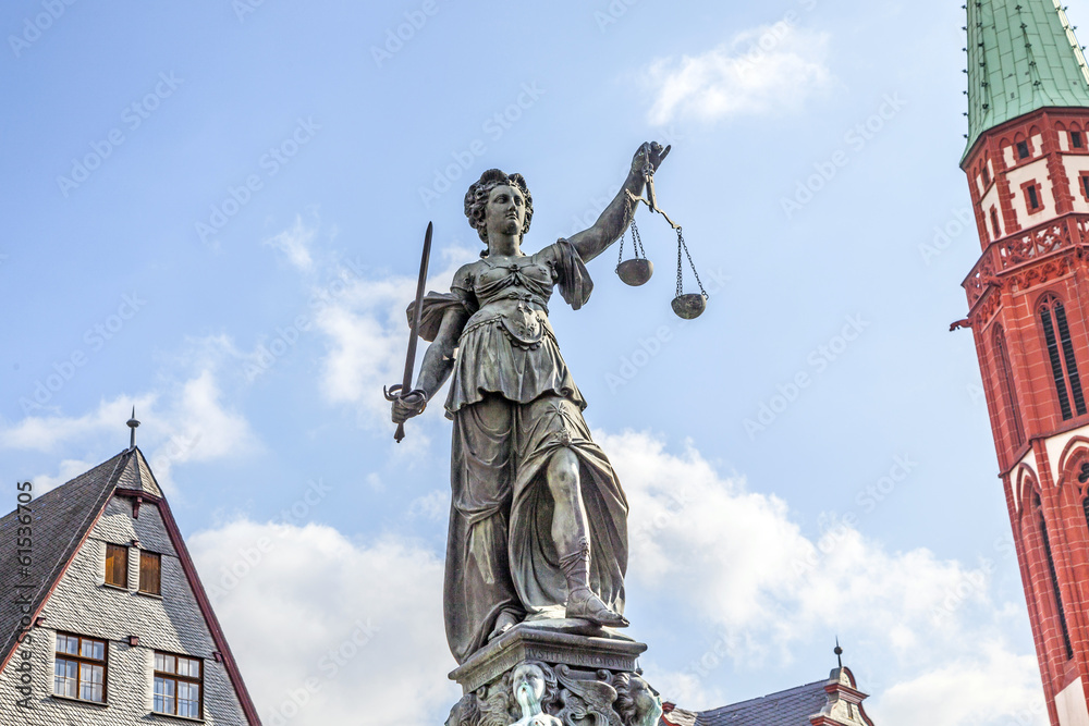 Fototapeta premium Statue of Lady Justice in front of the Romer in Frankfurt